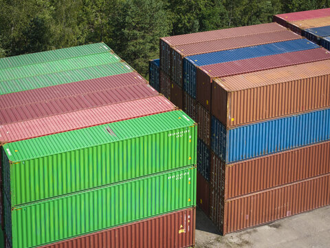 Aerial view of stacked colorful shipping containers at the Polzug Intermodal Polska terminal in Dabrowa Gornicza, Wojewodztwo slaskie, Poland.