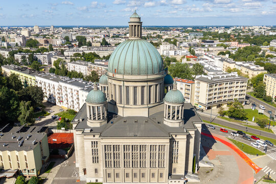 Aerial view of the Church of St. Roch with its prominent green dome and surrounding urban architecture in Lodz, Wojewodztwo lodzkie, Poland.