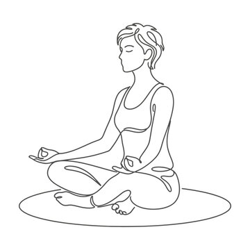 Woman meditating in lotus position on mat with eyes closed in peaceful serene environment