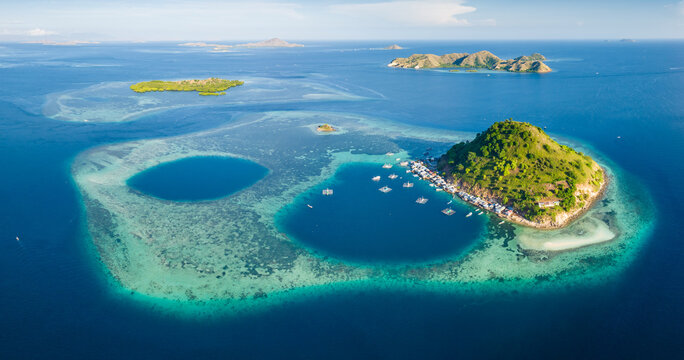 Aerial view of the coral reefs along the coast of the East Nusa Tenggara Islands in Komodo, Indonesia
