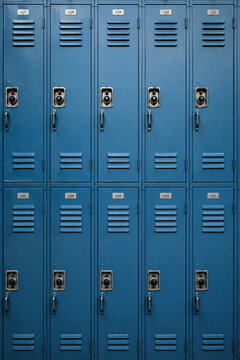 Vintage Blue Metal School Lockers in Symmetrical Grid Pattern