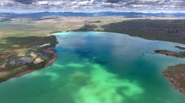 Turquoise water and open shoreline at Todurge Lake Sivas Turkey show freshwater scenery.