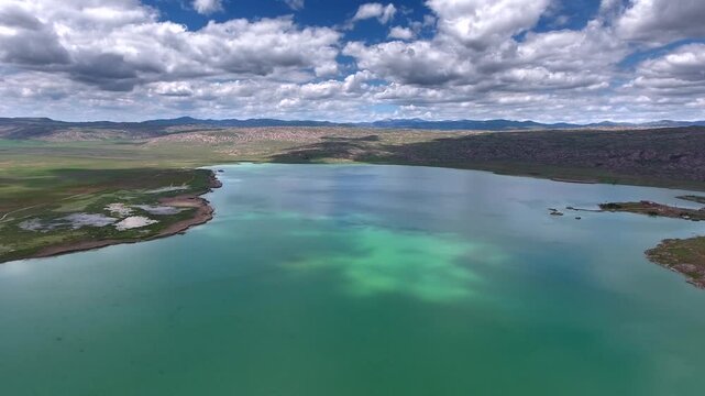 Turquoise water and open shoreline at Todurge Lake Sivas Turkey show freshwater scenery.