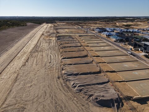 Aerial View of Residential Housing Development and Construction Site 