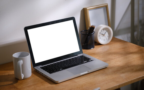 Blank computer screen displayed on a modern workspace desk for a digital mockup.