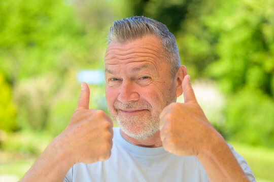 Senior Man Showing Double Thumbs