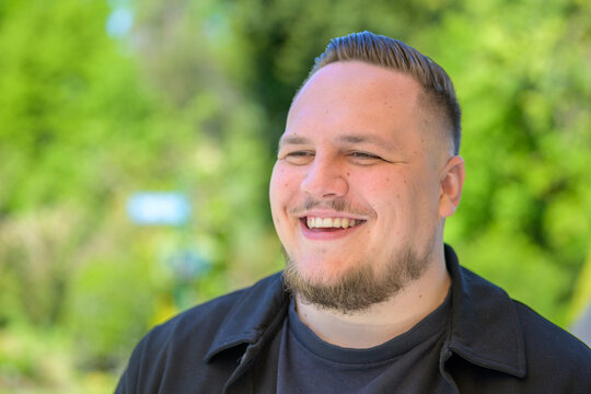 Laughing Young Man Outdoor Portrait