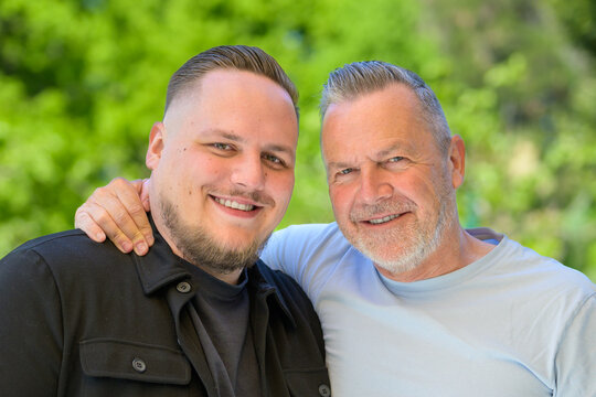Smiling Father And Son Portrait