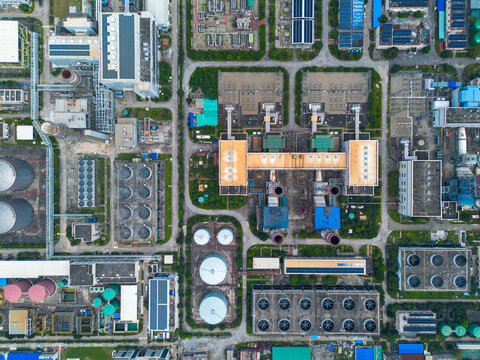 Aerial view of Sirajganj Power Station featuring industrial infrastructure, cooling towers, storage tanks, and complex power plant facilities in Sirajganj District, Rajshahi Division, Bangladesh.