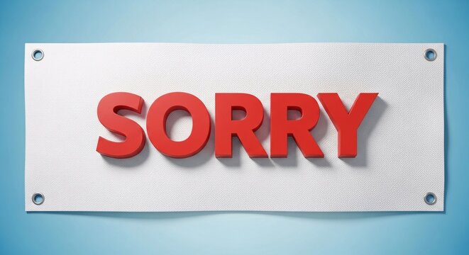 Clear apology sign with bold red 3D letters Sorry on white rectangular background mounted on blue wall for customer service or apology message communication