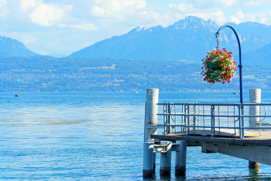 Scenic Pier at Lake Geneva in Morges Switzerland with Mountain View