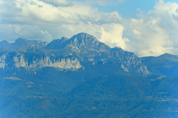 Fototapeta premium Majestic Alps Mountain Peaks Rising Under Cloudy Sky Near Morges
