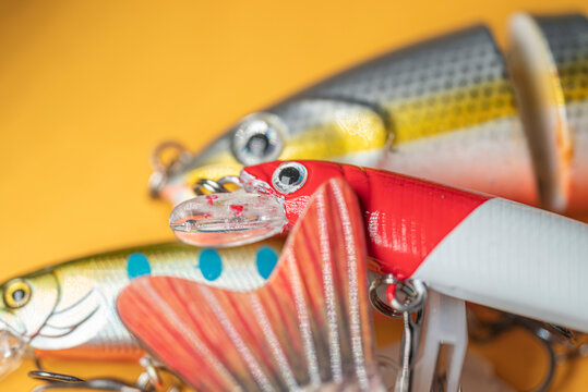 Red and white artificial fish bait with diving lip The Concept of angling preparation