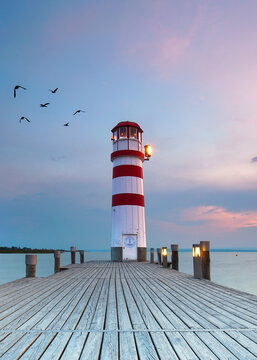beautiful nautical lighthouse on the pier