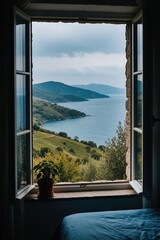 Fototapeta premium View from open window in hotel room looks over blue sea, green hills. Potted plant sits on window sill. Calm ocean landscape seen from indoor bedroom with view of mediterranean coast, summer sky.