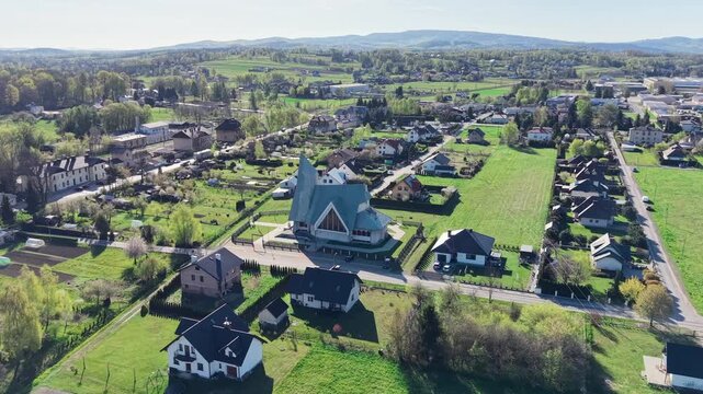 Religious building with sharp rooflines from an aerial perspective