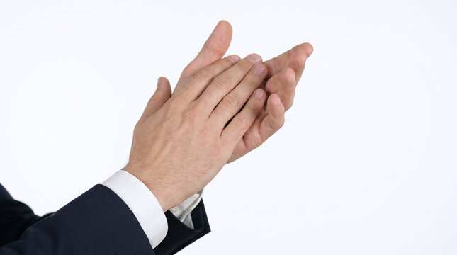 Photo, close-up, a man clapping with both hands, white background 