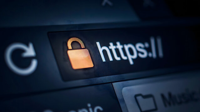 A close-up view of a web browser address bar displaying a secure https protocol with an orange padlock indicating a safe encrypted connection