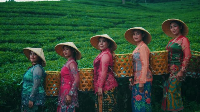 Group of Five Asian Women in Traditional Attire at Tea Plantation