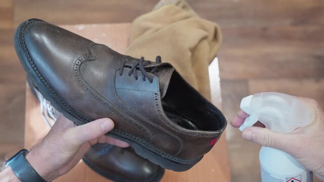 Odor spray is applied to the inside of footwear