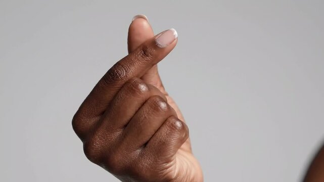 Dark Skin Hand Making Korean Finger Heart Love Gesture