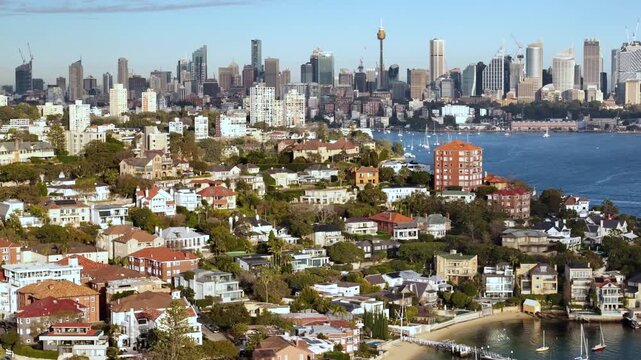 Aerial drone view of the harbour side suburb of Point Piper in East Sydney, NSW, Australia with Sydney City and Darling Point in the background on a sunny morning in August 2026 