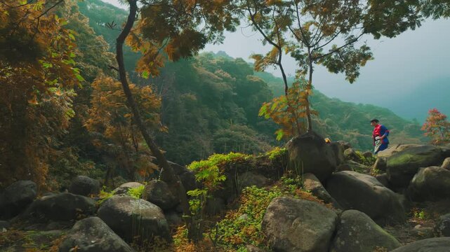 Scenic Landscape of Tropical Valley with Tiny Traditional Dancers