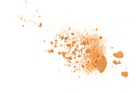Pile cake crumbs, cookie pieces flying isolated on white background, clipping path