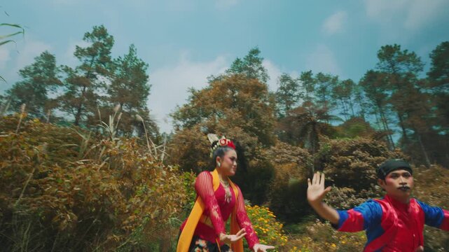 Dynamic Low Angle Shot of Traditional Dancers in Field