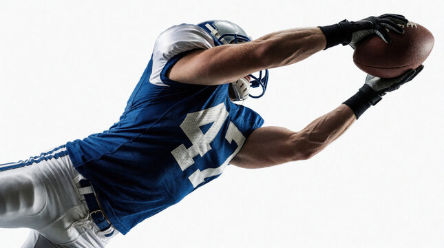 American football player jumps to catch ball in air. Athlete wears blue jersey, helmet during intense match. Pro sportsman reaches for pigskin on white background. Dynamic action shot of male player