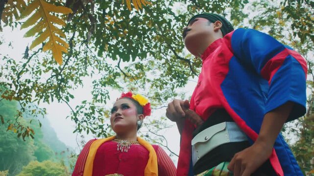 Cinematic Low Angle of Javanese Couple Looking Away