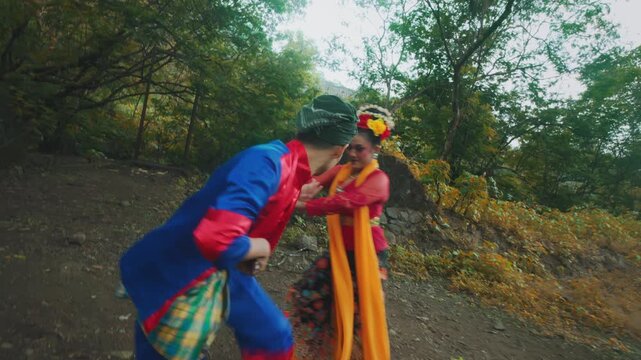 Traditional Indonesian Folk Dance Duet in Forest Setting