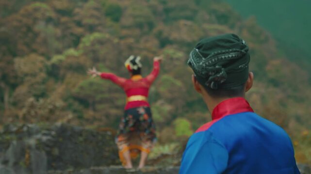 Rear View of Man in Blangkon Watching Cultural Dance Performance
