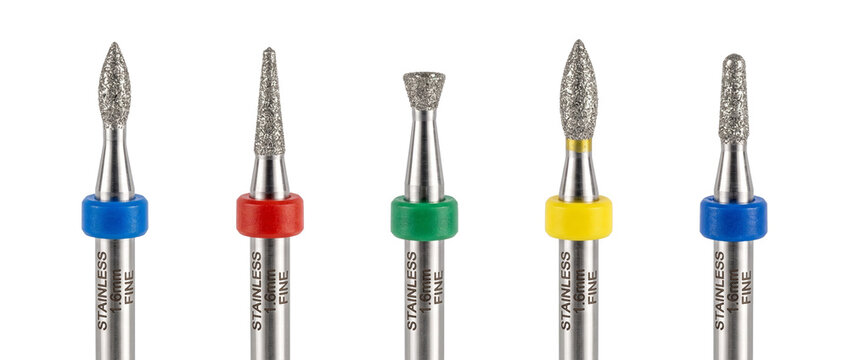 Dental diamond burs drill bits set for dentistry manicure isolated on black background professional stainless steel rotary tools for medical podiatry laboratory precision equipment accessory kit