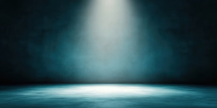 Empty spotlighted stage with teal textured backdrop and reflective floor, dramatic moody lighting conveying anticipation and solitude