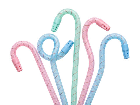 Dental saliva ejector suction tubes colorful flexible plastic aspirator tips arranged isolated on white background for hygiene oral care medical dentistry equipment supplies clinical treatment mockup