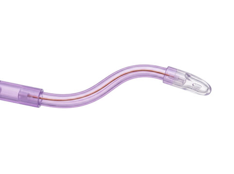 Dental saliva ejector suction tip flexible purple plastic aspirator tube for oral care procedure isolated on white background clinical medical dentistry equipment tool accessory close up macro view.