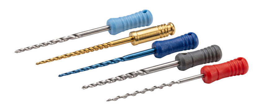 Dental endodontic root canal files instruments set aligned on black background for dentistry treatment procedure precision medical care steel reamers tools equipment therapy isolated closeup.
