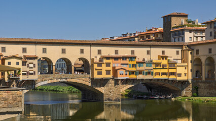 Fototapeta premium Vintage Photograph of Ponte Vecchio Bridge in Warm Yellow Tones, Florence Italy