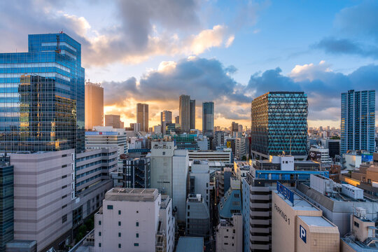 Modern city skyline and skyscrapers at sunrise in Toshima, Ikebukuro, Tokyo, Japan