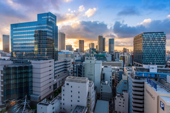 Modern city skyline and skyscrapers at sunrise in Toshima, Ikebukuro, Tokyo, Japan