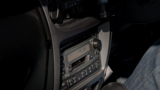 Insert an Audio Cassette into the Vintage Factory Car Stereo for a Retro Vibe  |  Japan