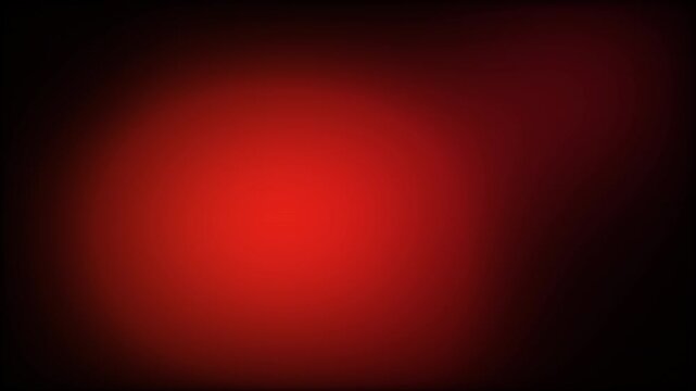 Intense ruby red glow fading into deep black cinematic visual texture