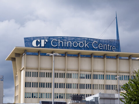 Calgary, AB, Canada. August 16, 2026. Low angle exterior view of the CF Chinook Centre shopping mall rooftop signage under cloudy sky.