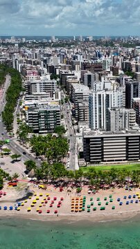 Maceio Alagoas Brazil at brazilian Northeast. Aerial panning shoot of turquoise water beach at Maceio Alagoas Brazil. Landmark beach tourism sights. Travel destination