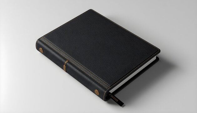 Black hardcover personal organizer notebook with textured fabric cover and elastic band closure