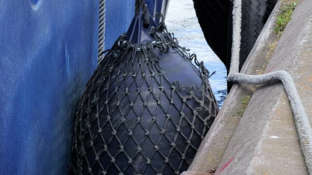 Boat fender bumper protecting ship hull
