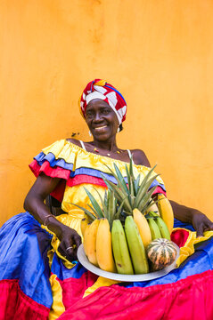 Palenquera fruit seller in traditional dress, Cartagena, Colombia