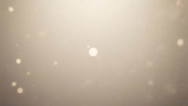 Dreamy golden particles background with warm bokeh overlay for emotional transience, gentle light transitions, subtle shimmer effect, and serene meditative projects video.