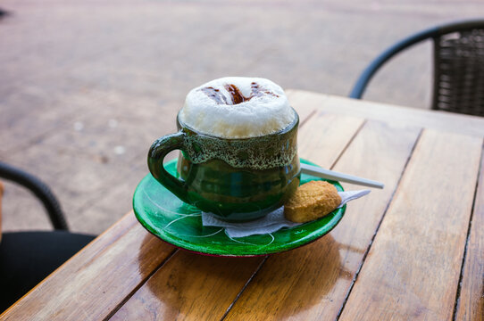 Cup of Colombian coffee on a rustic wooden table, Bogota, Colombia